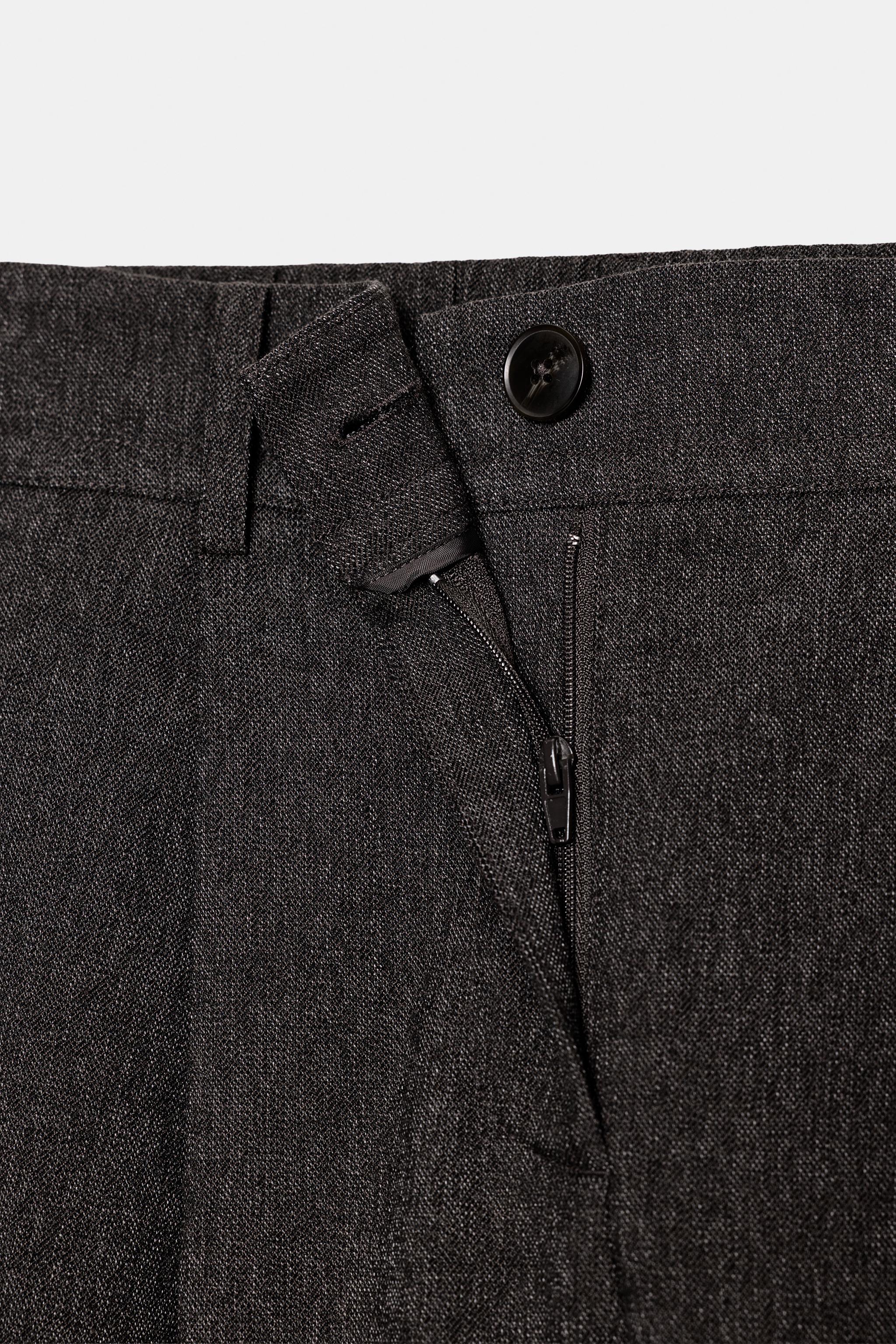 PLEATED PANTS WITH ELASTIC BACK